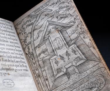 Detail from a printed texts shows a full-page illustration of Fort Caroline. Details include topography, trees, and text in French.